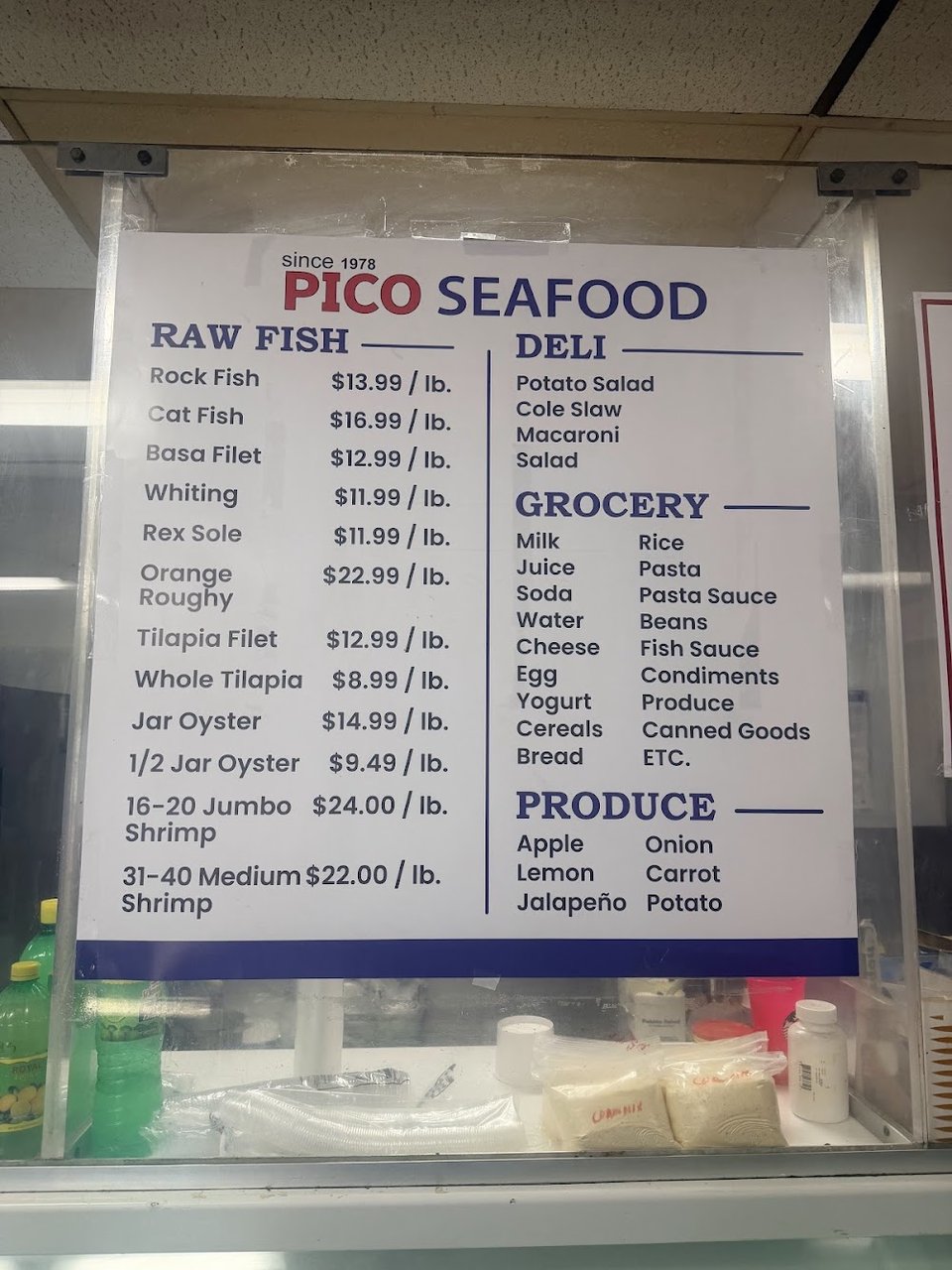 Printed menu with shrimp specials and family combos.